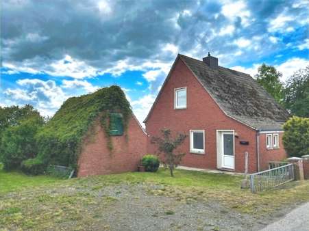 Seitenansicht Seitenansicht - Einfamilienhaus in 26736 Krummhörn mit 85m² kaufen