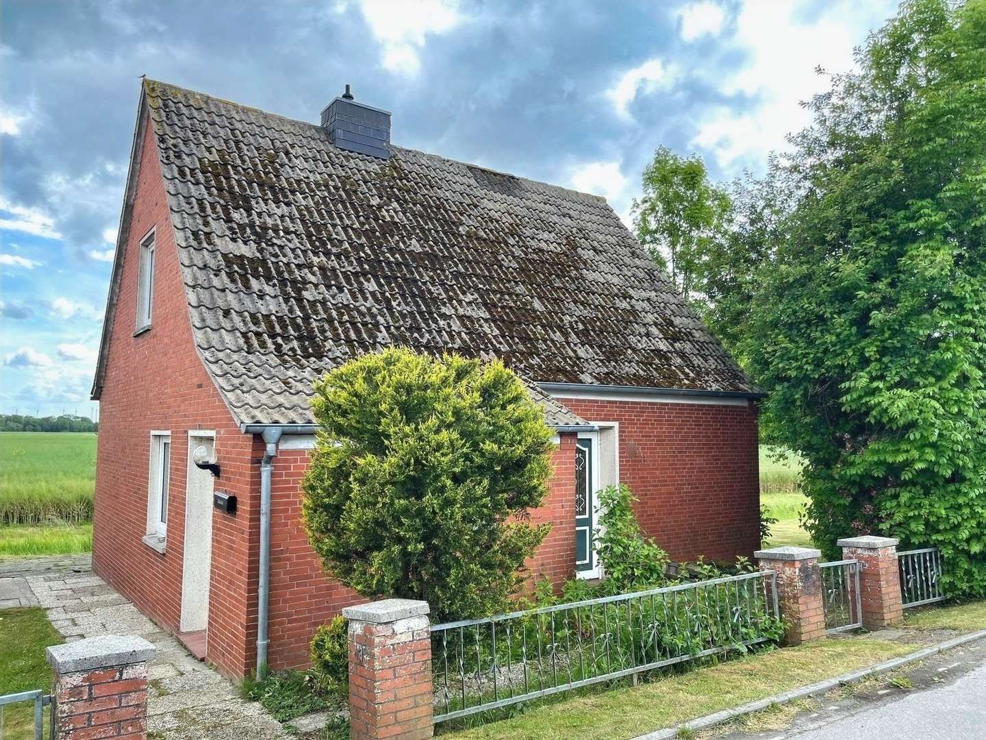 Seitenansicht Seitenansicht - Einfamilienhaus in 26736 Krummhörn mit 85m² kaufen
