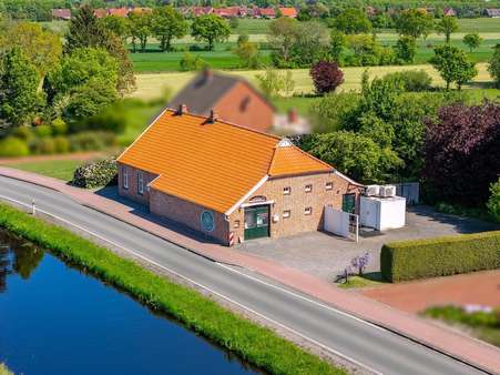 Rückansicht - Einfamilienhaus in 26629 Großefehn mit 146m² kaufen