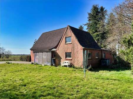 Außenansicht - Einfamilienhaus in 26529 Upgant-Schott mit 92m² kaufen