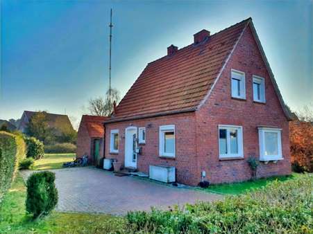 Seitenansicht - Einfamilienhaus in 26603 Aurich mit 95m² kaufen