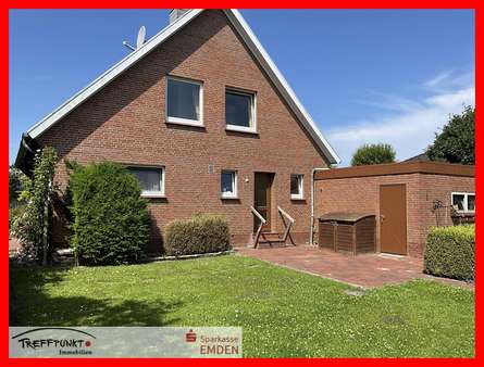 Hintere Ansicht mit 2. Eingang zur Garage Hintere Ansicht mit 2. Eingang zur Garage - Einfamilienhaus in 26759 Hinte mit 139m² kaufen