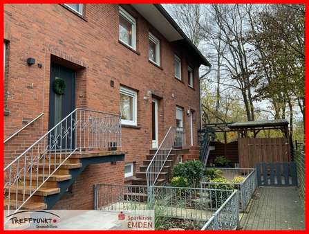 Vorderansicht mit gepflegter Zuwegung Vorderansicht mit gepflegter Zuwegung - Reihenmittelhaus in 26725 Emden mit 80m² kaufen