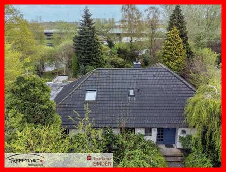 Blick auf den Eingangsbereich - Bungalow in 26725 Emden mit 160m² kaufen