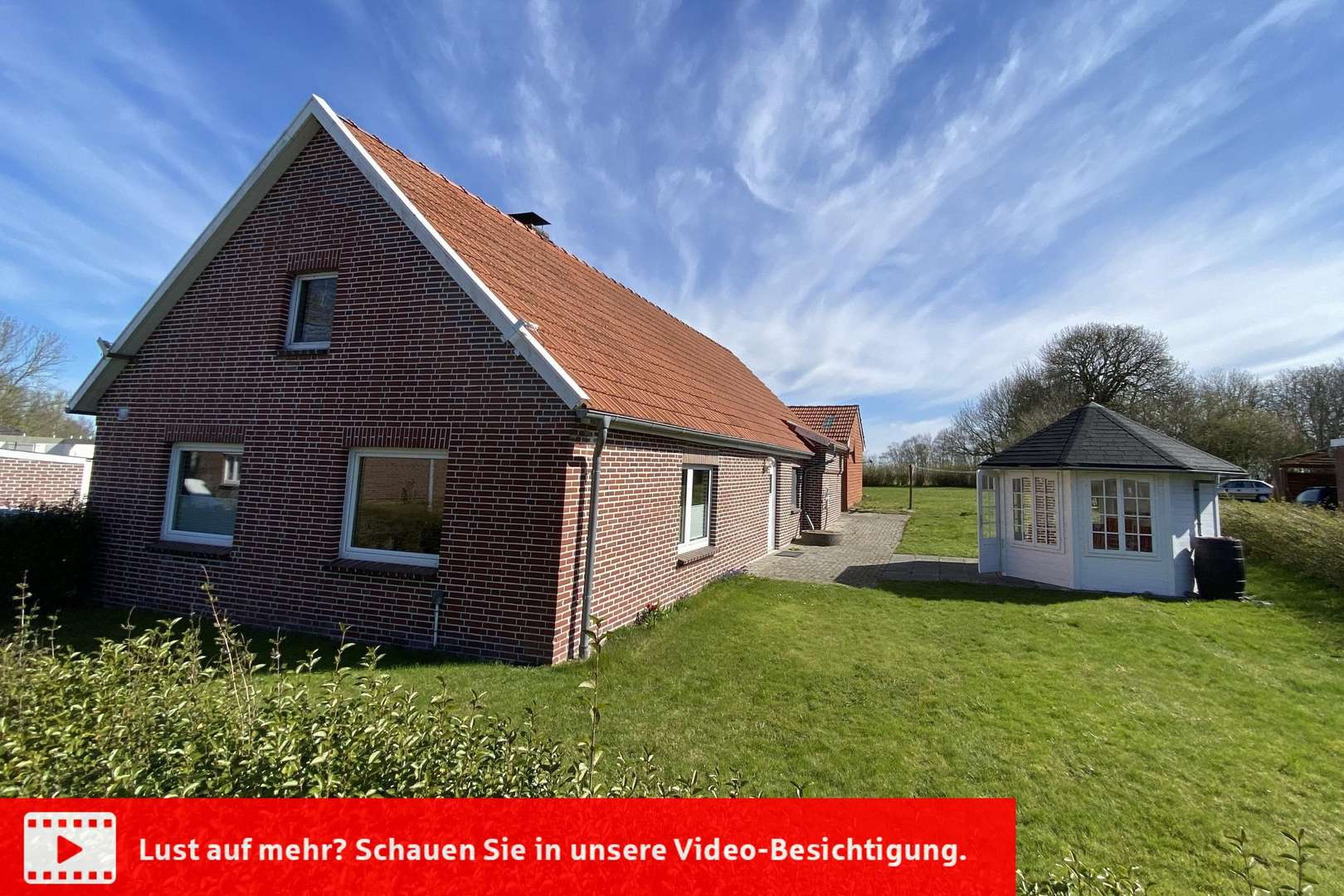 Seitliche Frontansicht - Einfamilienhaus in 26409 Wittmund mit 137m² kaufen