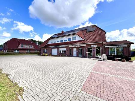 Frontansicht - Mehrfamilienhaus in 26789 Leer mit 280m² kaufen