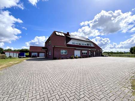 Frontansicht - Mehrfamilienhaus in 26789 Leer mit 280m² kaufen