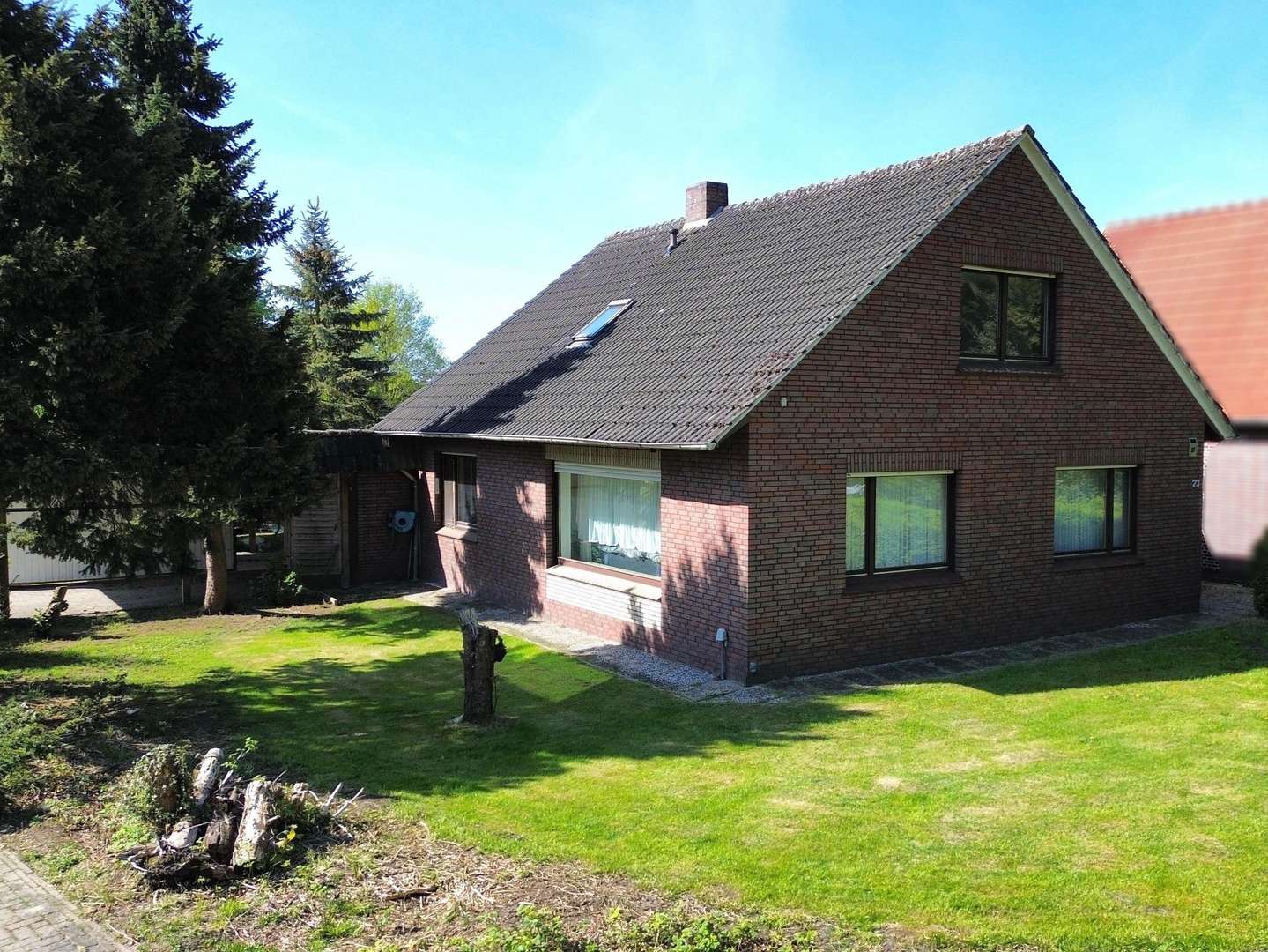 Seitenansicht - Einfamilienhaus in 26842 Ostrhauderfehn mit 129m² kaufen