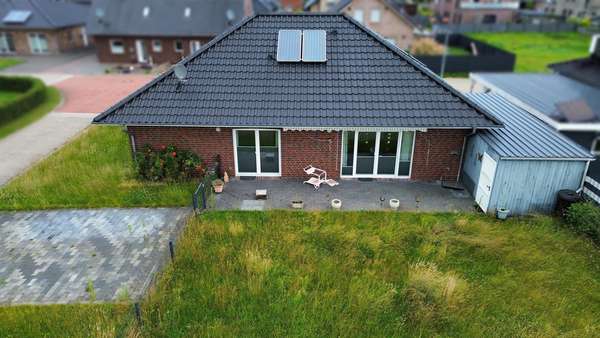 Rückansicht - Bungalow in 26802 Moormerland mit 113m² kaufen