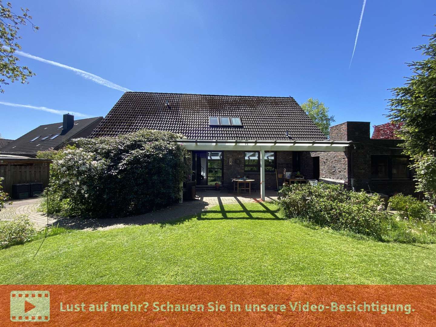 Rückansicht mit Terrasse - Einfamilienhaus in 26441 Jever mit 131m² kaufen