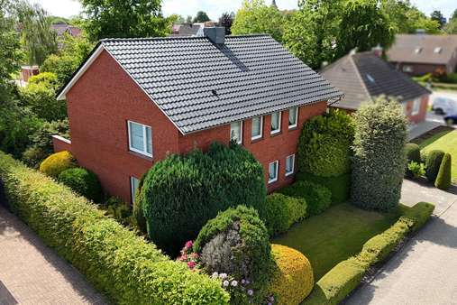 Frontansicht - Zweifamilienhaus in 26831 Bunde mit 165m² kaufen