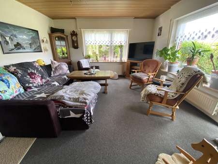 Wohnzimmer - Einfamilienhaus in 26532 Großheide mit 150m² kaufen