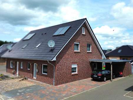 Seitenansicht - Doppelhaushälfte in 26802 Moormerland mit 117m² kaufen