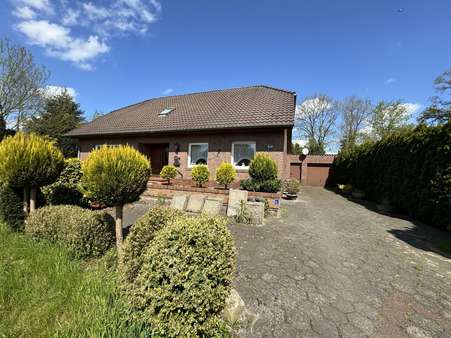 Vorderansicht - Einfamilienhaus in 26817 Rhauderfehn mit 172m² kaufen