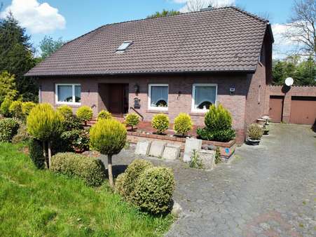 Vorderansicht - Einfamilienhaus in 26817 Rhauderfehn mit 172m² kaufen