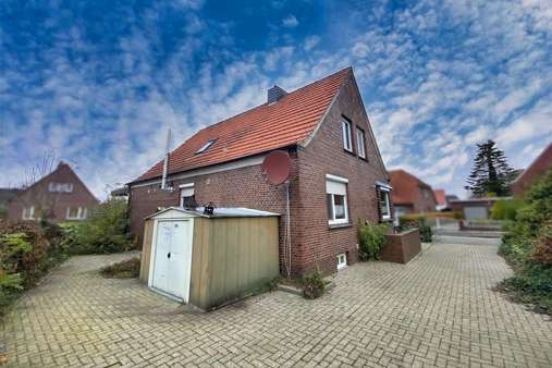 Rückansicht Wohnhaus Rückansicht Wohnhaus - Einfamilienhaus in 26441 Jever mit 90m² als Kapitalanlage kaufen