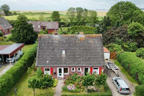 Frontansicht Frontansicht - Einfamilienhaus in 26844 Jemgum mit 125m² kaufen
