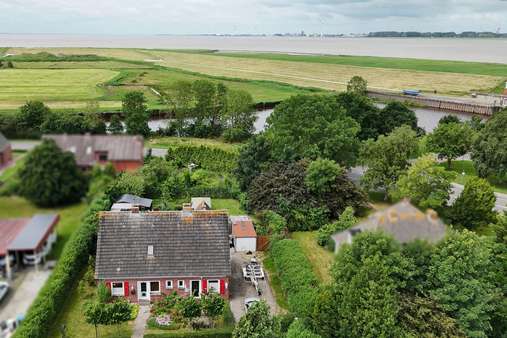Frontansicht Frontansicht - Einfamilienhaus in 26844 Jemgum mit 125m² kaufen
