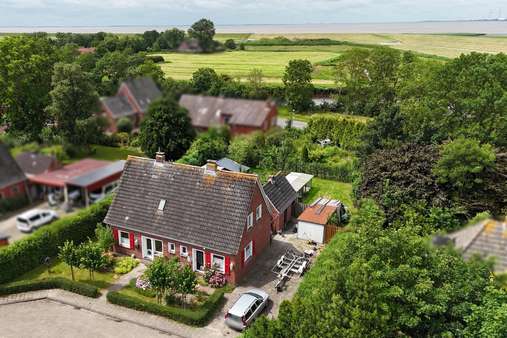 Frontansicht Frontansicht - Einfamilienhaus in 26844 Jemgum mit 125m² kaufen
