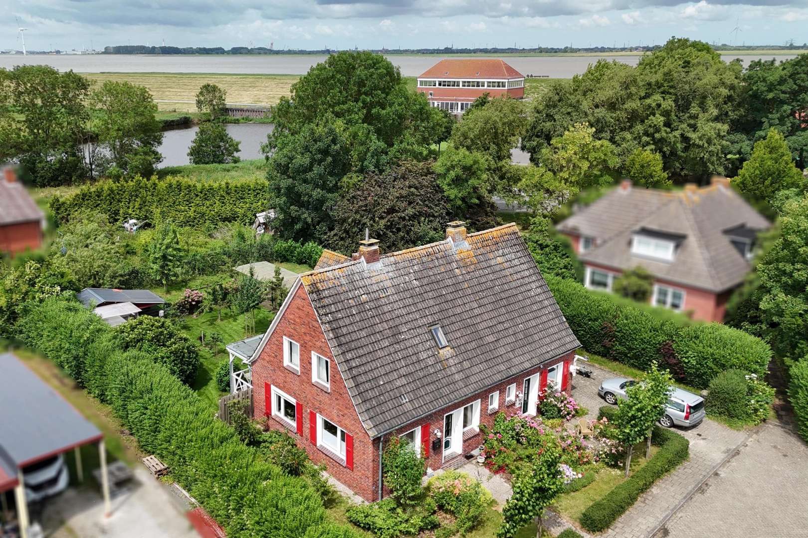 Frontansicht/ Blick zum Dollart Frontansicht/ Blick zum Dollart - Einfamilienhaus in 26844 Jemgum mit 125m² kaufen