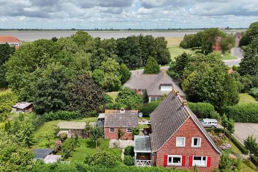 Seitenansicht Seitenansicht - Einfamilienhaus in 26844 Jemgum mit 125m² kaufen
