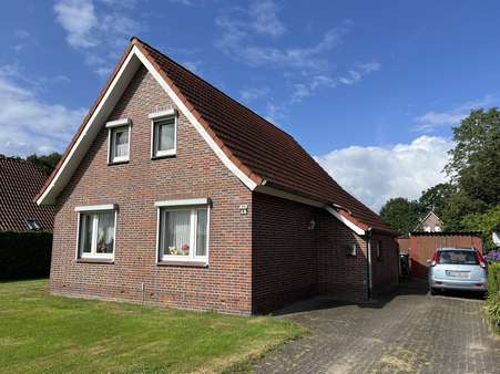 Außenansicht Außenansicht - Einfamilienhaus in 26670 Uplengen mit 107m² kaufen