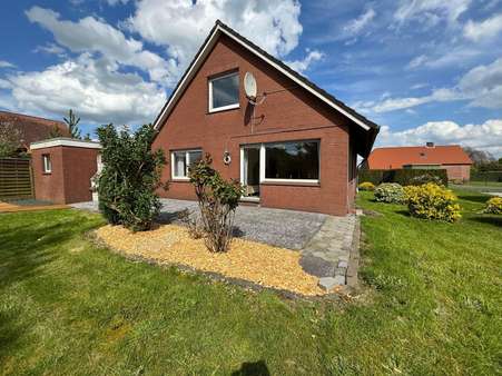 Rückansicht - Einfamilienhaus in 26802 Moormerland mit 82m² kaufen