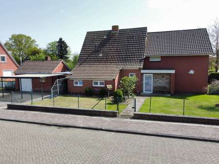 Vorderansicht - Einfamilienhaus in 26802 Moormerland mit 159m² kaufen