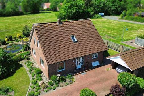 Seitenansicht - Einfamilienhaus in 26826 Weener mit 117m² kaufen
