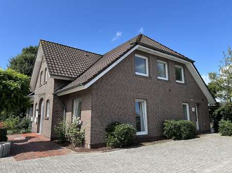 Seitenansicht - Bürohaus in 26817 Rhauderfehn mit 65m² kaufen