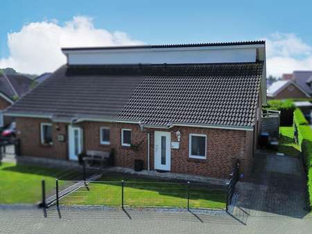 Vogelperspektive - Doppelhaushälfte in 26817 Rhauderfehn mit 103m² kaufen
