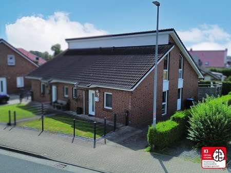 Vogelperspektive - Doppelhaushälfte in 26817 Rhauderfehn mit 103m² kaufen