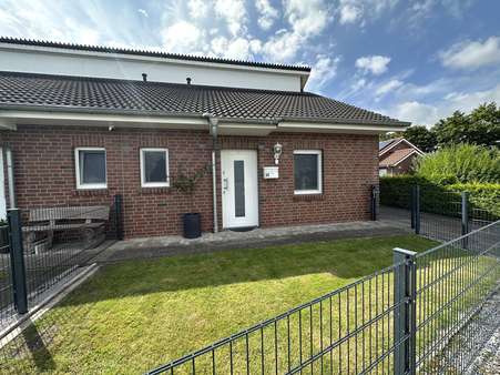 Vorderansicht - Doppelhaushälfte in 26817 Rhauderfehn mit 103m² kaufen