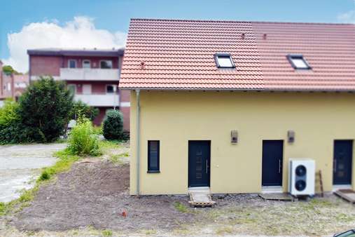 Frontansicht Frontansicht - Doppelhaushälfte in 26789 Leer mit 90m² kaufen