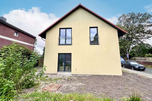 Seitenansicht Seitenansicht - Doppelhaushälfte in 26789 Leer mit 90m² kaufen