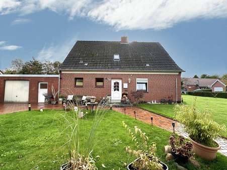 Seitenansicht Seitenansicht - Einfamilienhaus in 26817 Rhauderfehn mit 127m² kaufen