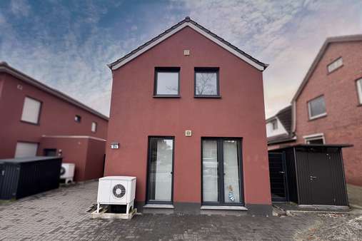 Frontansicht Frontansicht - Dachgeschosswohnung in 26789 Leer mit 79m² kaufen