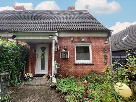 Vorderansicht - Doppelhaushälfte in 26835 Brinkum mit 95m² günstig kaufen