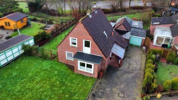 Hausansicht - Einfamilienhaus in 26409 Wittmund mit 105m² günstig kaufen
