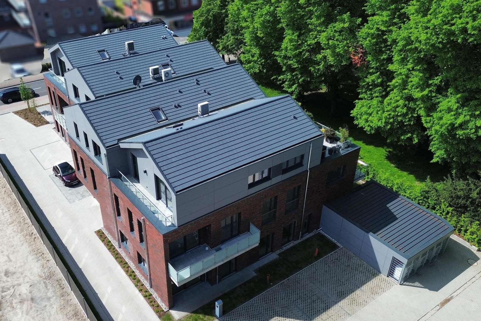 Rückansicht - Erdgeschosswohnung in 26789 Leer mit 81m² kaufen