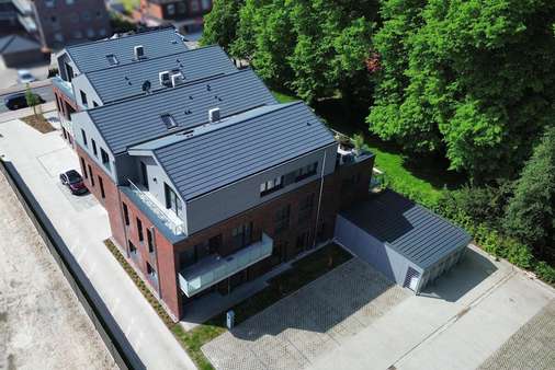 Rückansicht - Etagenwohnung in 26789 Leer mit 92m² kaufen