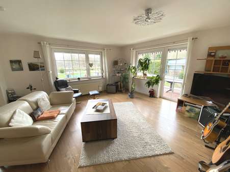 Wohnzimmer Bungalow - Zweifamilienhaus in 26409 Wittmund mit 154m² kaufen