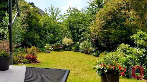 Garten im Sommer - Einfamilienhaus in 68519 Viernheim mit 210m² günstig kaufen