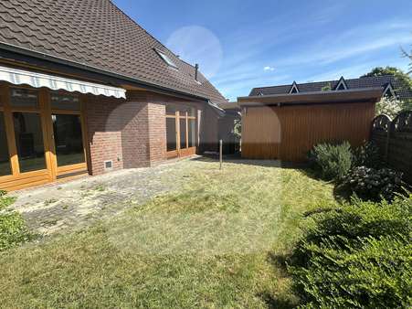 Garten mit Terrasse - Einfamilienhaus in 28857 Syke mit 124m² kaufen