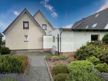 Rückansicht Rückansicht - Einfamilienhaus in 27239 Twistringen mit 122m² kaufen