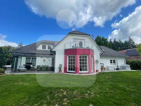 Außenansicht Gartenseite Außenansicht Gartenseite - Einfamilienhaus in 49453 Hemsloh mit 230m² kaufen