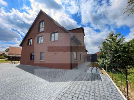 Seitenansicht - Etagenwohnung in 49448 Brockum mit 84m² kaufen