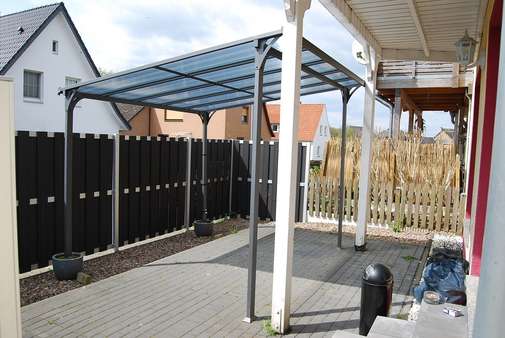 Terrasse mit Überdachung - Doppelhaushälfte in 27211 Bassum mit 93m² günstig kaufen