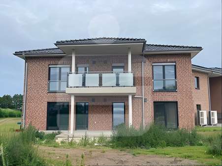 Außenansicht Außenansicht - Erdgeschosswohnung in 49419 Wagenfeld mit 100m² kaufen