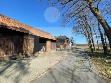 Seitenansicht mit Nebengebäude - Einfamilienhaus in 49406 Barnstorf mit 120m² kaufen